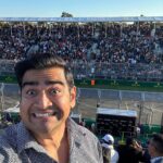 Dilruk Jayasinha Instagram - From last Sunday - me playing it TOTALLY COOL at The Melbourne @f1! Thanks @paramountplusau for the incredible experience and access to the pit! I’d like to think that me crop dusting Le Clerc’s pit crew contributed to his DNF ! (Jokes I like Charles, don’t come at me 🙏🏾) F1 Australian Grand Prix