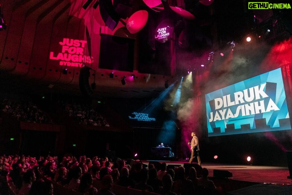 Dilruk Jayasinha Instagram - Last Friday night! Some incredible shots by @nickmickpics at the @justforlaughs_syd gala show at The Sydney Opera House. An absolute dream gig! Thanks one and all!