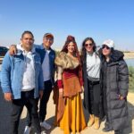 Donia Samir Ghanem Instagram - شكرا للنجوم ضيوف الشرف الكبار اوي اللي بجد نورونا و ماحدش اتردد فيهم لحظة واحدة و كلهم جايين مش فارق معاهم حتي ايه الدور اللي هيعملوه او مساحته أد ايه هم بس جم عشان يقفوا جنبنا أحمد فهمي أشرف عبد الباقي كريم عفيفي عم صلاح عبد الله سلوي عثمان ايمان السيد فتوح أحمد علاء زينهم أحمد سلطان شكرا زينب العبد علي لذاذتك و شطارتك شكرا المؤلف الجامد كريم يوسف وفريق الكتابة سامح جمال وندي عزت وأشرف نصر انتوا تفوقتوا علي نفسكوا عملتوا حدوتة فيها كل أنواع الدراما كوميدي ساسبنس خيال فانتازيا كمان اديتوا مساحة للأغاني تكون في مكانها مش مقحمة شكرا حسام حبيب مدير التصوير الجامد قوي اللي مش مهم عنده أي حاجة غير انه يطلع صورة مختلفة و مميزة و لايقة مع مود الحدوتة وشكرا لفريق التصوير الجامد شكرا للعبقري مهندس الديكور سامر الجمال والمهندس احمد صبري والمهندسات الشاطرين همسه ورشا انتوا أبدعتوا في وقت قياسي و تعبتوا أوي و الحمد لله تعبكوا كان واضح جدا شكرا حسن مصطفي مصمم الازياء المميز جدا، مش ممكن الاهتمام و الشطارة حتي في التفاصيل و اكسسوارات الشخصيات كلها شكرا مايا حداد الشاطرة جدااااا كعادتك طبعا و كل التقدير للشركة المتحدة علي دعمهم للفن المصري جينا بقي للثلاثي اللي حققلي أحلامي في الأغاني سواء في مسرحية آنستونا او في مسلسل جت سليمة شكرا للشاعر الجامد ايمن بهجت قمر انا مش عارفة اقول لك ايه بجد ازاي ما شاء الله بتترجم معني الأغنية اللي مطلوبة منك بسلاسة و تميز و في نفس الوقت مفردات جديدة و قريبك مننا كلنا ما شاء الله عليك شكرا للملحن المميز جدا عمرو مصطفي اللي بيتميز برقي رهيب في الألحان حتي لو بيلحن أغنية شعبية التفوق مش جديد عليك شكرا للموزع الجامد نابلسي اللي بيبَروِز اللحن و الكلام بطريقة خطيرة و متنوعة في كل أغنية و ده غير الموسيقى التصورية اللي اضافت للمسلسل جامد من فضلكوا تابعوا البوست التالت