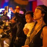 Donisha Rita Claire Prendergast Instagram – Reminder to Self: To be a Creator and a Creative is a gift and a responsibility. We must manage both with care. I’m so humbled and joyful to be able to create and direct the visuals for @iamsharonmarley new single Butterflies in the Skies with my 🌞Kitai on my hip. It was hectic, stressful and intense and still such an empowering experience. This post is really a shout out to ALL Mothers finding the balance and making it happen. Give Thanks to the entire cast and crew for your creative collaboration and contribution. We made this together 👊🏾

It’s okay to include your small humans in the mix, make space for them, expose them to what you do in real time, communicate the support you need from others to mother. The whole Earth is a classroom, which means we can create classrooms everywhere.  Mothering while making magic. Issa vibe. 

Go watch video on Sharon Marley YouTube and let me know what you think✨🌺🦋

📸 by @radiantsun9 Miami, Florida