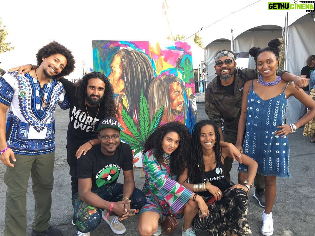 Donisha Rita Claire Prendergast Instagram - #wewillrizetogether team is growing by leaps and bounds. @thekayafest has created the space for #wewillrizetogether 💜 @komiolaf will be finishing this live painting and it will be auctioned at The Black Star Party on Monday April 30 at Los Globos. Big Love to @machelmontano for passing through and putting your mark on the painting #kayafest2018 Kaya Fest