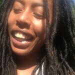 Donisha Rita Claire Prendergast Instagram – ☺️☺️🌞🙏🏾💜🦋💃🏾🌺 We think ideas belong to us, when they really come from the Universe and have been waiting for the moment to be born. Working together as individuals in a global comeunity, we were able to impact the lives of 700 students and teachers, and create a space for their voices to be heard. Using #blackpanther as a tool to create a space for a necessary conversation to be instigated. I am humbled by what this idea organically became. A huge Thabks to the teachers who still participated and made it happen even though they were on an islandwide teacher’s strike. More Power to you! Give Thanks @chronixxmusic for your donation and presence at the panel discussions with the youth after the film. It was important 🙏🏾 . @hello_sian you are an amazing team of strong African women in the diaspora, and the role you played as hands and hearts getting it done was right in time. Thanks for also getting more local partners involved. To our phenomenal facilitators @terrikarelle @emprezzgolding and @marlonmusique for not hesitating at the request, and imparting pieces of your souls during this lesson alongside our panelists @leciagaye, Steven Golding and Kadamawe K’nife 🦋 @tarrusrileyja for always supporting youth development. @manifesto_ja and our volunteers @african__negus, @brammashanti @dsejamaica for camera support. @ashann_will and the Mico Teacher’s University Team, @shacquille_henry and @facesoftivoligardens for your selfless efficiency while you were also planning #sistersspeak. @ilovemobay for your volunteer support in Mobay. @bobmarleyfoundation for continuing to facilitate work and building with us. To Kathy, Dalle and W for working hard to make sure I could physically be here. On behalf of the We Will Rize Together Core Team, we are humbled and inspired to continue to build comeunity. Harambe! @chakabars @mzmo_tars @omega_axsal @fionascott_73 @komiolaf 💜Great job team. It takes a village and we will rize together. My heart is full. There are so many fighting to Right our story. Click link in and share. One Love is more than a song, it is action. Could you… be Love? Click link in bio and share 💜#wewillrizetogether #buildcomeunity #belove