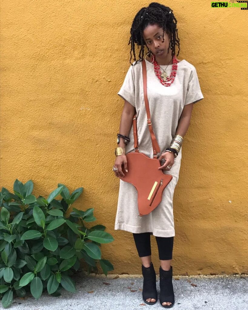Donisha Rita Claire Prendergast Instagram - Reminder to self: Stay #undefined. Our Identity as Africans in the diaspora is a thing that instigates a lot of questions. Conversations that try to evaluate ‘well, exactly how African are you?’ Maybe, Maybe, Maybe it’s the kink in my hair, or the clothes I choose to wear. Or maybe it’s the tone of my skin, or what happens to my DNA when I hear Africans sing. Maybe, Maybe, Maybe it’s the curve of my hips, or the shape of my nose and my lips. Or the fact that my ancestors were apart of Kingdoms on the continent before we were stolen away as chattel on a ship. How African are you? Be what it may, whatever it is, it comes from within, and lives without external opinion. A simple truth... We are not African because we are born in Africa. We are African because Africa is born in us. May that Be enough #ghana #jamaica #belove #africandiaspora #eachoneteachone #africaunite #healnothurt #wewillrizetogether 📸@ahutchphoto Africa bag, with materials sourced and manufactured in East and West Africa, designed by @orijinculture. Bridge the gap #supportblackbusiness #buildcomeunity