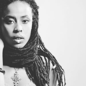 Donisha Rita Claire Prendergast Instagram - Eyes wide open, I saw @marvel #BlackPanther a few days ago alongside my sistrens dressed in our Afrofuturistic gear, like many others in the audience, heart open to perceive this monumental film. #wakandaforever... I get it. I embrace the many conversations around Africa and the diaspora that have been stimulated and re-invigorated at this time, and the images of brothers and sisters being bold and beautiful in our Roots. I watched and revelled in this future where an African King, who rules a Sovereign African country that has never known colonization, is able to use his super powers to fight for justice, and take the initiative to bridge the gap between the continent and the diaspora. As I allowed the experience to ruminate in my spirit and mind, I couldn’t shake the feeling… I know this story. I recognized the work and even the wants of the piece, but I know this story... The Black Panther - The Lion of Judah. Emperor Haile Selassie I, King of the sovereign African Nation Ethiopia, that has never been colonized, also aspired to develop its sacred knowledge and innovate technology for the advancement of humanity. His Majesty too has super powers that he has used to inspire and defend Africans in the diaspora. 
FUN FACT: In 1966, the same year that Marvel was inspired to create the Black Panther, Haile Selassie I visited Jamaica and purchased land to build a high school. He is the only African King in History to have done this. How much of this Afrofuturistic story that we are telling today has already been written in pages of History? Tell the children the truth. #createclassroomseverywhere 
Ok🤓So the We Will Rize Together campaign will be sharing this global vibration with the Haile Selassie High School Students and we’ve pulled together a quick campaign to raise the funds while the energy is high. An important conversation is happening globally around the film industry, Africa and black representation with a subtext of action through education. We want the youths to be present for this History Lesson too. Why not? Click link in bio to donate #buildcomeunity #wewillrizetogether #africandiaspora #eachoneteachone #africaunite #rightourstory
📸@komiolaf