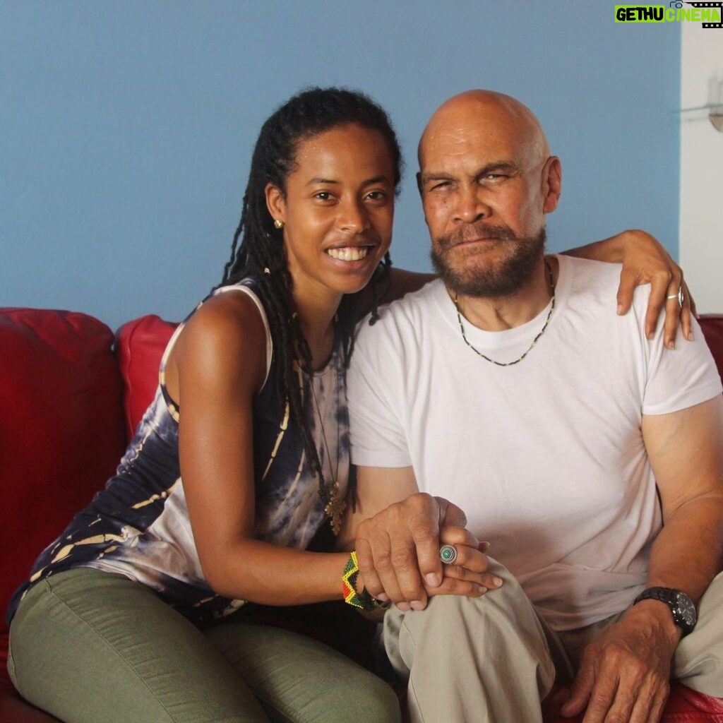 Donisha Rita Claire Prendergast Instagram - Monty Howell is the eldest son of Leonard Howell, the Founding Father of the Rastafari movement. Leonard Howell purchased 500 acres of land to create a safe space for ex slaves seeking a new way of life off the plantation. For 16 years, Pinnacle was fully self sufficient from the farming of fruits, vegetables and ganja. When he was 5 years old, his mother was killed and his father framed for her murder. He recalls standing in the Spanish Town court room watching his father from behind the barriers while standing on his tip toes. “My father was a very forthright man. Even when they tried to tear him down and belittle him in front of the nation, he never bowed his head. He knew he was a threat to them, a free mind in a colonial world. He never hurt my mother. My father wasn’t even on the Pinnacle grounds when it happened. I watched as the State took turns trying to twist the truth, eventually sending him to the asylum on many occasions to de-stabilize the growing movement. He had gone to Kingston on a business trip as he often did when she died. She went missing for days, and when they found her, she had to be buried her on the spot even before he came back home. For years, I remember going to her grave side and sitting under that tree for hours just to feel close to her. Children are the real victims of political violence.“ Today 80 plus years later, when he visits Pinnacle, the trees and rocks that once marked this memory have been destroyed and sold to the highest bidder. In May 1954, the JLP government destroyed the community and scattered hundreds of families, destitute in the streets. Pinnacle lands have been stolen by private developers with full knowledge and ultimate participation of the Jamaican government. Private homes now cover the hills where the first RasTafari community existed, and still the Jamaican government continues to deny their responsibility in restoring the legacy and birthplace of the RasTafari movement. Let us never forget the sacrifices that many have had to endure in the name of RasTafari. #preserveheritage #rememberpinnacle #thefightisntover #mightcannotdefeatright