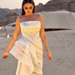 Dorra Instagram - Throwback to those unpublished beautiful shots in this magic place Alula wearing a dress by @maisonyeya Styled by my dear @youmnamoustafa Makeup @monagamalofficial 🤍 #boho chic #boho #style #icon #cinematic #beauty #artistic #dorra #DorraZarrouk AlUla, Saudi Arabia
