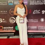Dorra Instagram - 🤍 𝔸𝕓𝕠𝕦𝕥 𝕝𝕒𝕤𝕥 𝕟𝕚𝕘𝕙𝕥 ✨ @michael5inco #fashionshow @alameinfestival @northsquarealamein @counselmasters.eg @poshmanagement_ Wearing @zeenazaki dress Hairstylist @alsagheersalons @malaksamy_1 Makeup @monagamalofficial Jewlery @iramjewelry_ #العلمين_الجديدة New Alamein