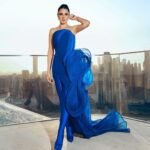 Dorra Instagram - Feeling like a 🦅💙🌇 Wearing @gauravguptaofficial Styled by @mohamedashraff Makeup @monagamalofficial 📸 @theebory Dubai - دبى