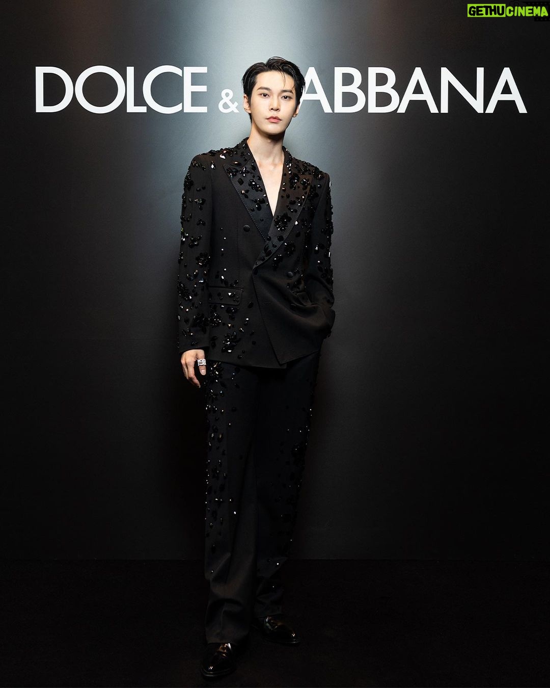 Doyoung Instagram - In attendance to the #DGSS24 Men’s Fashion Show “STILE” wearing a black double breasted crystal tuxedo styled with a pair of pointy black shiny boots. The behind the scenes fitting session: a testament to the meticulous #DGFattoAMano and attention to detail that goes into every #DolceGabbana creation. Milano viale piave Metropol