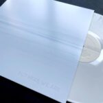 Dug One Instagram - It’s always an honor to work with @foofighters This is the design for their latest album “But Here We Are”. Definitely a new turn for us as we explored minimalism and new techniques printing white on white.