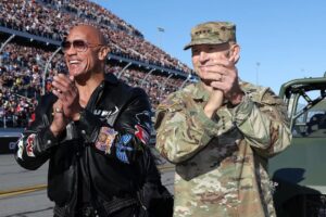 Dwayne Johnson Instagram - I was very moved by this moment, when our Chaplain led over 100,000 of us in prayer. 

You could feel the mana in the air. 

Moment of gratitude. 
Lifetime of loyalty. 

Thank you General Randy George of our U.S. Army and all of our military men, women and their families for your service — I’m grateful to the core. 

Always good to see you, General. 

With great respect and I’ll see everyone down the road. 

Rock