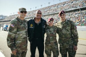 Dwayne Johnson Instagram - I was very moved by this moment, when our Chaplain led over 100,000 of us in prayer. 

You could feel the mana in the air. 

Moment of gratitude. 
Lifetime of loyalty. 

Thank you General Randy George of our U.S. Army and all of our military men, women and their families for your service — I’m grateful to the core. 

Always good to see you, General. 

With great respect and I’ll see everyone down the road. 

Rock
