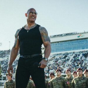 Dwayne Johnson Instagram - Microphone in hand. 
100,000+ strong. 
Live as the world watches. 

This is heaven. 
I’m a grateful I get to do crazy stuff like this. 

“In the proud spirit of America 
In the proud spirit of our great country 
FINALLY, The Rock says 
Drivers start your engines” 

#Daytona500
#GrandMarshall 
#PeoplesChamp 
@nascar 
@daytona

📸• @thisisamandaw