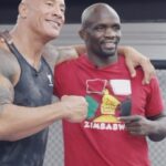 Dwayne Johnson Instagram - He fights to pay it forward 🙏🏾👏🏾💪🏾 Wishing my brother @thembagorimbo_mma best of luck today in his @UFC welterweight fight on FIGHT NIGHT on @ESPN+ @ 1PM PT Themba’s amazing story caught my eye when MMA fans sent me an ESPN tweet where Themba had just $7 bucks in his bank account before his last fight. I flew to meet him and instantly realized he’s a special & humble human being. I’m honored to play a very very small role in his inspiring journey. Best of luck my brother and welcome to our @zoaenergy TEAM #UFCVegas85 #ThembaGorimbo #ZOAAthlete #UFCWelterweight #Zimbabwe 🇿🇼
