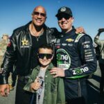 Dwayne Johnson Instagram - Great to meet the boys before they started kicking ass on that track 🫱🏼‍🫲🏾🏁 These @nascar drivers work their asses off and get pulled in a million different directions- I saw it up close and 💯 understand the push and pull energy they deal with. Much respect to these boys & their teams ☝🏾 #greatamericanrace #daytona500 @jimmiejohnson @rowdybusch @jhnemechek @davidlragan @rosschastain @ryanblaney10 @ryanpreece_ 📸: @thisisamandaw