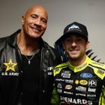 Dwayne Johnson Instagram - Great to meet the boys before they started kicking ass on that track 🫱🏼‍🫲🏾🏁 These @nascar drivers work their asses off and get pulled in a million different directions- I saw it up close and 💯 understand the push and pull energy they deal with. Much respect to these boys & their teams ☝🏾 #greatamericanrace #daytona500 @jimmiejohnson @rowdybusch @jhnemechek @davidlragan @rosschastain @ryanblaney10 @ryanpreece_ 📸: @thisisamandaw