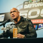 Dwayne Johnson Instagram - Sunday press conference - pre race 🏁🏎️ Thank you to all the members of the press for the great questions and fun hang. We’ll do it again and see ya down the road. @daytona @nascar #grandmarshal #peopleschamp