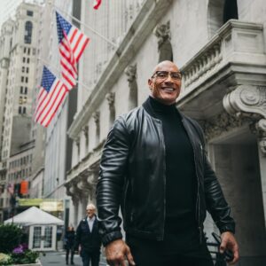 Dwayne Johnson Instagram - From $7 bucks to this surreal day. 
Crazy. 

Thank you @nyse for the incredible & very warm  welcome. 

Honored to join the Board of Directors for @tkogrp and honored to ring the iconic bell to open our market. 

Let’s get to work. 
@wwe @ufc 
#peopleschamp

@thisisamandaw 📸