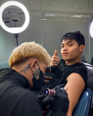 Elijah Canlas Instagram - Remember when you’d always joke about wanting to get a full sleeve of tattoos, JM? Tapos sasakyan ko yung pagbibiro mo kay mom until she gets pissed and tells us to not go home if we do push through with it. Guess what? Kuya Jerom and I just got tatted today. We even brought Iya with us. Mom’s fine with it now. She actually wants to get one herself. Even Dad wants to get tatted now. 

Pero siyempre tungkol sa’yo ang design. Your favorite thumbs up pose with your name enlaced on it designed by ate Zia. Our cousins also got the same design marked on them. Matching kami lahat. 

I want you with me forever and always. We all do. I can’t believe it hasn’t even been a month. Thank you for being my strength. I miss you so much it hurts. Pero kaya ito ni kuya. Kaya namin ito. We love you more than anything, JM! Habang buhay. Habambuhay.