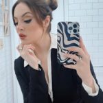 Elizabeth Gillies Instagram - Not an ad for a phone case, though it most certainly looks like one.