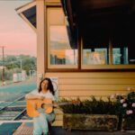 Ella Hooper Instagram - Just a girl, waiting on a train, (and that’s not just some country song bs to me, as you know I travel by train, all, the, time..) waiting for you to book tickets to my show w. @ramblinvanwalker at @thebridgehotelcastlemaine on Saturday! 💋💋💋 picturesque pic by my old pal @w_i_l_k #violetskies #violettown #trainstation #ohmygoddess #onelastshow