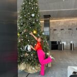 Ella Hooper Instagram - Was nice to put my media barbie hat on (actually, pants..) today for a little TV work. Will spill the deets when they’re ready! 🎄🎄🎄 Feeling this high viz day glo festive ass look though! #partelf (stunning silk ‘bulb’ top that I adore, by @annacordellclothing ) #mediamaking #slashie #merryandBRIGHT !!!