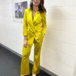 Ellie Taylor Instagram - Big Bird gorra glow up 🌟💛🌞🐥 Styling @tesswrightstylist Make up @justwade Suit @karen_millen