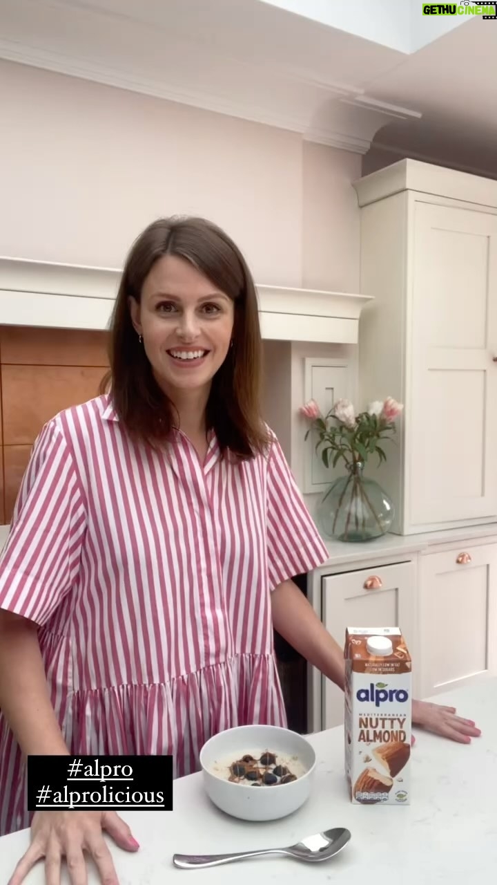 Ellie Taylor Instagram - Delicious, tasty and satisfying, this is a banger of a breakfast. And I know my brekkie, babes… @alpro #Alprolicious #AD Try it! Muesli Handful of bluebs Squeeze of nut butter Alpro Nutty Almond Drink