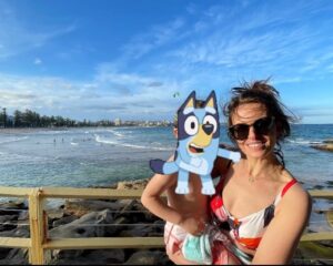 Ellie Taylor Instagram - Took a break Down Under with my little Bluey. A beaut of a trip full of sun, sea, delicious egg & bacon rolls, excellent margs and some bloody bonza Sheilas/Bruces. 

However I can’t pretend I don’t have concerns about something I witnessed first hand over there which I found incredibly worrying. An issue which is blighting the gorgeous homeland of my husband. And that is what I can only describe as a MULLET EPIDEMIC. They are everywhere. EVERYWHERE. I even saw a few toddler aged kids with them. No irony there. Just some little boys eating sand on the beach whose parents CHOSE for them to look like 1989 Andre Agassi. 🤯