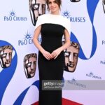 Ellie Taylor Instagram – Baby’s first BAFTA 💛
Swipe for generic posing followed by how I looked at the beginning of the day about to clean pigeon shit off the trampoline.

Make up @hannahmartinmakeup 
Styling @tesswrightstylist 
Dress @safiyaa_official 
Clutch @cultgaia 
Earrings @chanelofficial
