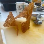 Ellie Taylor Instagram – G’day! Thanks for all your lovely messages about #GBBO last night. So glad you enjoyed the show. I love Sydders so much and it was an honour to build this iconic structure out of over-baked gingerbread held together by spit and panic.

Swipe to see my first attempt, and then swipe again to see my original idea which was the Opera House out of brandy snaps. Yeh. That’s why I changed to the bridge…

I had such a fun day practicing my bakes with my mum in my kitchen where we mostly laughed at the disasters we’d created. We got that special day because mum was fortunate enough to survive the cancer diagnosis she received 20 years ago. But not everyone’s mums do. Or dads, siblings or god forbid, children. So please donate, even just a couple of quid. 1 in 2 of us, baby. 1 in 2. Please donate at channel4.com/su2c

(And for those asking – my shirt is from H&M about 5 years ago, and as for my 💄 and 💅- no idea – profesh bakers like me have no time for such dets)