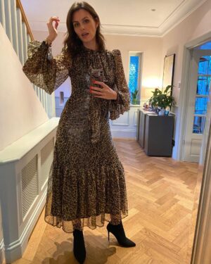 Ellie Taylor Instagram - Serving you ‘new stepmom from the city dresses inappropriately for rural school’s nativity’. Just @queensofarchive lending me another belter of frock. If it hasn’t got a puff sleeve and shoulder pads, what’s the f*cking point.

(They send me stuff. I wear it. I send it back. Gorgeous and sustainable. #gifted)