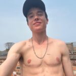 Elliot Page Instagram - Dysphoria used to be especially rife in the summer. No layers, just a T-shirt - or layers and oh so sweaty - constantly looking down, readjusting my oversized T. It feels so f’ing good soaking in the sun now, I never thought I could experience this, the joy I feel in my body. I am so grateful for what gender affirming care has allowed me and I look forward to sharing more of my journey soon. #transjoy