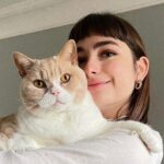 Ellise Chappell Instagram - Long-distance relationships can be difficult but we make it work 🐈 Happy Holidays! ♥️🌟🕯