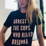 Emily Baldoni Instagram - It’s been 150 days since Breonna Taylor was murdered in her sleep by Jonathan Mattingly, Brett Hankison, and Myles Cosgrove—and her killers have not been charged. ⁣ ⁣ Too often Black women who die from police violence are forgotten. Let’s stay loud, keep demanding justice for Breonna and her family, and SAY HER NAME. ⁣ ⁣ This campaign and t-shirt was created by @phenomenal in partnership with the Breonna Taylor Foundation, to which all profits will be donated. (Art by @arlyn.garcia)