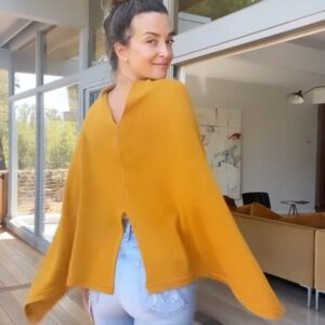 Emily Baldoni Instagram - I’m not sure when breastfeeding became a reason for mamas to wear baby panda print but @weareamma we believe mamas have every right to feel gorgeous and stylish, especially when she’s deep in early motherhood. ⁣
⁣
Mamas, you’re allowed to make it about you. You’re allowed to treat yourselves. ⁣
⁣
For those of you who want a little bit of cover, the Cocoon gives you a beautiful open knit design that is lightweight, breathable and versatile, the only one of its kind on the market. It’s still one of my favorite things to wear, long after my nursing days. Definitely worthy of twirling 😘⁣
⁣
https://shop.weareamma.com/thecocoon