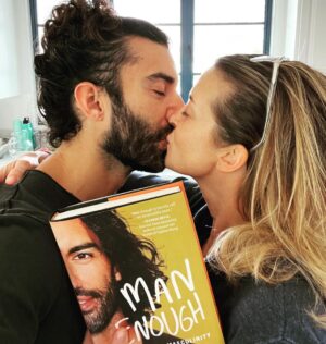 Emily Baldoni Instagram - (Picture me shouting from the rooftops 📢!!) It is finally heeeeeeeere!!!!!! @justinbaldoni ‘s incredible book MAN ENOUGH is released to the world TODAY 💃🏻 🥳💃🏻 🥳💃🏻🥳 ⁣
⁣
Something I love and admire the most in people is when they walk their talk. We all stumble and fall, but it’s deeply impressing and inspiring when people get back up and continue the walk no matter what. I see my husband do this, each and every day. His commitment to authenticity, healing and learning has taken him on a deep dive into his own masculinity and humanity and he is sharing all the most profound, brutally honest, awkward, confronting and rewarding experiences and reflections with you in this book. He has poured his heart into every single page. It’s an invitation to the reader to go on their own exploration of what it means to be “man enough”, and more importantly, to be human. ⁣
⁣
As a woman, wife and mother I am deeply grateful and so damn proud of the courage Justin had to put all this on paper for the world to see. This man, and this book, has my WHOLE heart. ⁣
⁣
Get your copy and let me know what you think. Link for the premier collectibles is in my bio ❤️⁣
⁣
(Or you can buy this book anywhere you would buy a book, please support independent book stores!) ⁣
⁣
#manenough #undefiningmymasculinity⁣
@wearemanenough @harpercollins  @harperonebooks