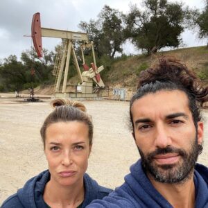 Emily Baldoni Instagram - On this #earthday we decided to take a morning hike. We thought these photos sum up the heartbreak of what we are doing to our planet. 

Just behind a gorgeous lookout lies a hideous oil well. Forcefully penetrating the earth and taking from it over and over again. If you look closely behind us you’ll also notice that the trees have black bark on them. Slowly recovering from the devastating #thomasfire a few years ago. 

This year in Southern California we are seeing unprecedented low levels of rain which is terrifying for coming fire season which the local fire department told us yesterday now lasts pretty much all year. 

And unfortunately, these are just a few examples of how we are knowingly continuing to destroy our beautiful home. 

If we want to have anything left of our planet to give to our children and grandchildren, we must work together and listen to the 97% of scientists who remind us that climate change is real. It’s not a hoax or some government conspiracy. It’s caused by us, but the good news is that it can also be fixed by us. Much of the damage can’t be undone, but we DO hold the power to reverse a lot of it. First we must come together and acknowledge the role we ALL play in it.

#earthday #onlyoneplanet #onepeople