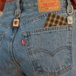 Emma Chamberlain Instagram - i designed a pair of 501’s with @levis 😁👖❤️ my favorite jeans in the WORLD!!! with a comfortable fit, cutie little belt charms and plaid patches… go grab a pair if u wanna 👖 #150YearsOf501