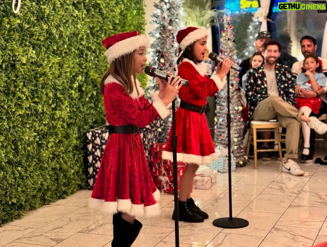 Emmy Buckner Instagram - Once upon a December, I hosted my first ‘Holiday Concert and Celebration’ filled with nearly 20 performances, crafts, games, a cookie decorating station, a hot chocolate bar, a photo booth, and of course, a bar for the adults 🥂 It was truly one of the best nights of 2023 and encompassed what the holiday season is all about. These kiddos came to me, weeks after delivering baby Cayden, and had their lessons in his nursery. Cayden was often involved as an audience member- lol. These photos and videos are just a SMALL glimpse of the night. I will NEVER forget when Baby Cayden came out as Baby Santa and surprised us all and the support and love from the audience! 🥹🎄 What I get to do for “work” is magical. I want to thank my community of students and their families for making this “idea” a reality❤️ I want to thank Mr. Max for assisting with set, sound, food, the kids, everything- love you @maxchucker !! @violetcactusvenue thank you for letting us rent the space and host the event here- it was perfect! And thank you Tina for all the help and whipping out those merry margaritas!! 🍹 And thank you Aunt Shelby @shelbywulfert for getting Baby Santa there safely and always being there for us -we love you! 💋 Violet Cactus Studio