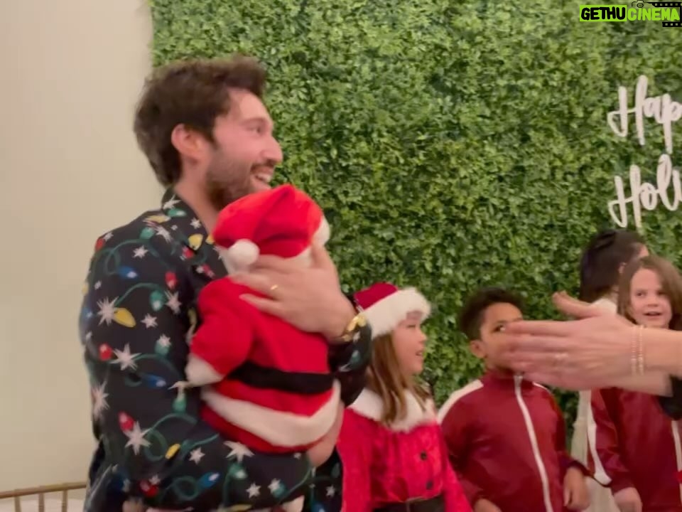 Emmy Buckner Instagram - Once upon a December, I hosted my first ‘Holiday Concert and Celebration’ filled with nearly 20 performances, crafts, games, a cookie decorating station, a hot chocolate bar, a photo booth, and of course, a bar for the adults 🥂 It was truly one of the best nights of 2023 and encompassed what the holiday season is all about. These kiddos came to me, weeks after delivering baby Cayden, and had their lessons in his nursery. Cayden was often involved as an audience member- lol. These photos and videos are just a SMALL glimpse of the night. I will NEVER forget when Baby Cayden came out as Baby Santa and surprised us all and the support and love from the audience! 🥹🎄 What I get to do for “work” is magical. I want to thank my community of students and their families for making this “idea” a reality❤️ I want to thank Mr. Max for assisting with set, sound, food, the kids, everything- love you @maxchucker !! @violetcactusvenue thank you for letting us rent the space and host the event here- it was perfect! And thank you Tina for all the help and whipping out those merry margaritas!! 🍹 And thank you Aunt Shelby @shelbywulfert for getting Baby Santa there safely and always being there for us -we love you! 💋 Violet Cactus Studio