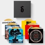 Eric Bass Instagram - ⚠️ Attention Shinedown Nation! ⚠️ Lots of exciting news to share. We are reissuing all of our albums on exclusive colored vinyl, offering a special Box Set, and launching the new Premium Clothing Line: SD Limited next Friday, November 27th.   Starting on 11/27 you will be able to pre-order the Box Set featuring gold vinyl pressings of all 6 of our albums. The box set includes a limited number of units worldwide, and contains a brand new 15th anniversary cover for 'Us and Them!'    *The Box Set will begin shipping in January and all individual vinyl will ship in February*   🔗 in bio