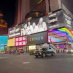 Eric Bass Instagram - They’ll put anybody up on a billboard in Times Square these days. 😳 😂 Couldn’t be more grateful for our team. #planetzero #shinedown #daylight #timessquare #release #releaseweek #blessed #purplehairdontcare #rock #rockisntdead