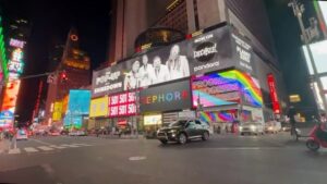 Eric Bass Instagram - They’ll put anybody up on a billboard in Times Square these days. 😳 😂 Couldn’t be more grateful for our team. #planetzero #shinedown #daylight #timessquare #release #releaseweek #blessed #purplehairdontcare #rock #rockisntdead