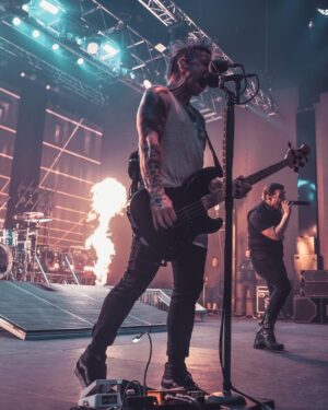 Eric Bass Instagram - Suit guy, tank top guy, or curtsy guy? 🤔 #shinedown #planetzero #suitguy #tanktop #curtsy #saturday #saturdayvibes #rockandroll