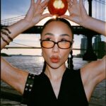Eva Marisol Gutowski Instagram - Concrete jungle wet dream tomato 🍅 me on film in essentially my backyard. New York, New York