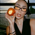 Eva Marisol Gutowski Instagram - Concrete jungle wet dream tomato 🍅 me on film in essentially my backyard. New York, New York