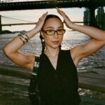 Eva Marisol Gutowski Instagram - Concrete jungle wet dream tomato 🍅 me on film in essentially my backyard. New York, New York