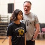 Eva Noblezada Instagram - I’ve only ever worked with one actor who would read Shakespeare backstage. And whose impressive cv as an actor inspired me daily to dig my feet into the world of whatever material I was working on in order to give my characters freedom within the structure. Patrick, it’s been an honor! We can’t wait to watch in awe of whatever you do next. Onstage, on film and in life. Always love to you and your beautiful wonder woman @realpaigedavis 🥹🤍 Happy Trails, my Hades! 🎊 (and omggggg look at us in this pic. we’re babies😭🤣) National Theatre