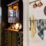 Evan Thomas Instagram - Cozy cabin vibes. #bargainblock Season 3 episode 2. Hope you liked last night’s episode! It was fun to renovate and design this house. We loved how the solution to the plumbing layout issues resulted in such a beautiful kitchen. Turning difficulties into design features is always so gratifying. Also LOVED how the butler’s pantry turned out with that vintage hutch. And that PLAID tile with those beautiful countertops 😍😍 What was your favorite part of last nights episode? Countertops: @greatlakesgm Tile: @virginiatilecompany Wallpaper: @detroitwallpaper Coffee table: @motorcitybarrels Detroit, Michigan